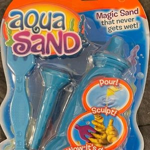 NEW in package - Aqua Sand - the sand that doesn’t get wet.